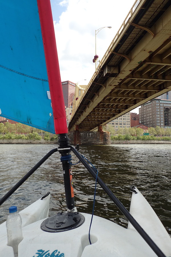 Sailing under a bridge